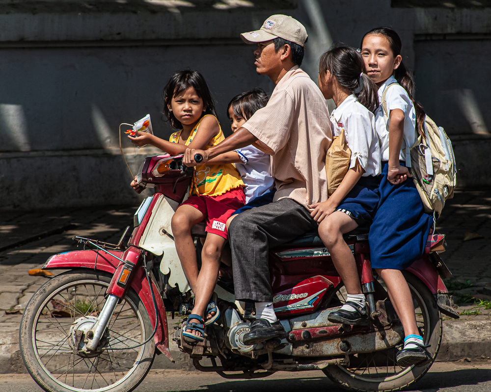 Moped Overload Cambodia by Neil Harris