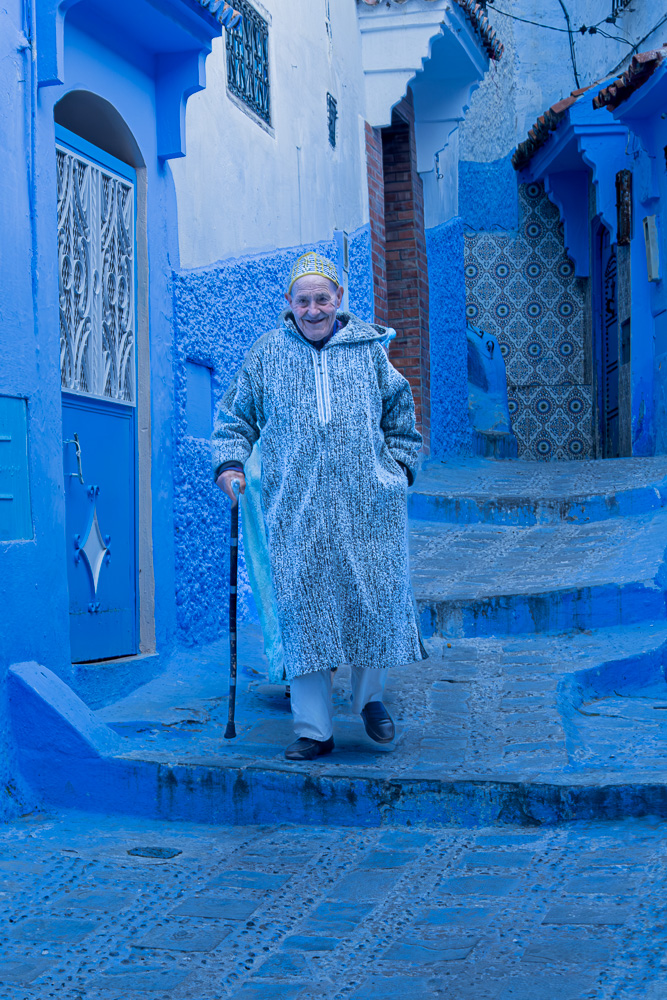 Moroccan Man In Blue Chefchaouen Morocco by Jane Tearle