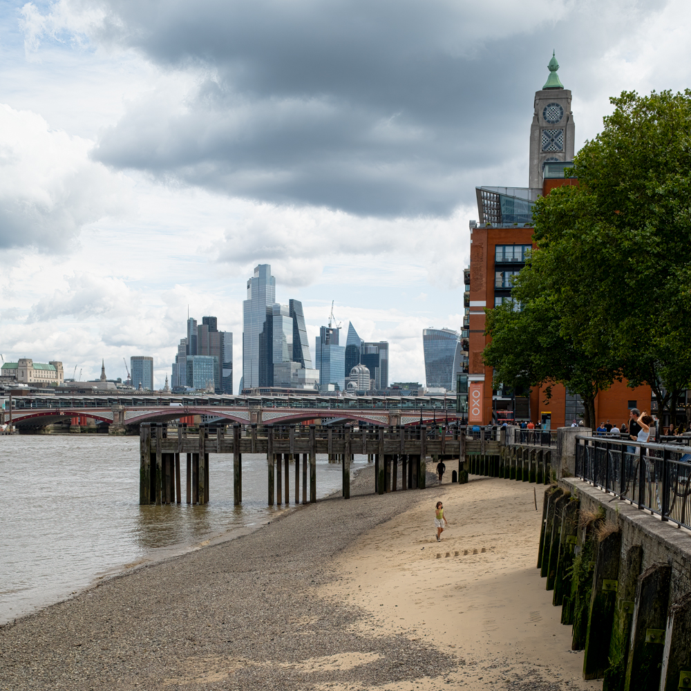 On The Beach By The Thames In London by Neil Purcell