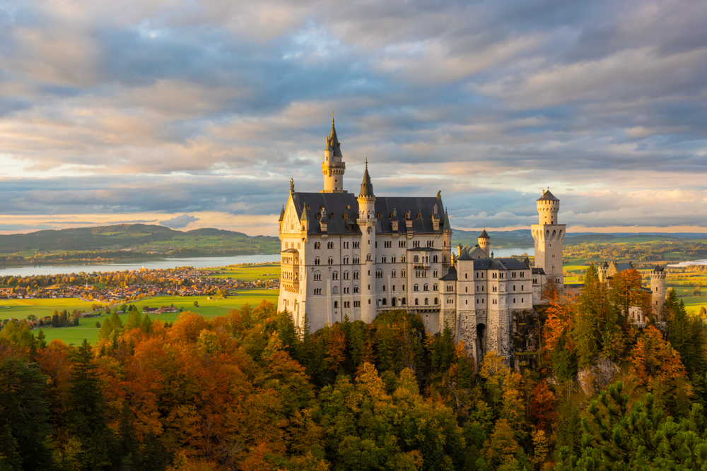 Sunset at Neuschwanstein Castle in Schwangau, Germany by Travis Thompson