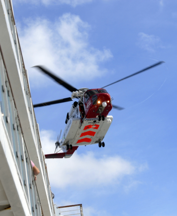 Coastguard Rescue Helicopter Over Cruise Liner, North Sea