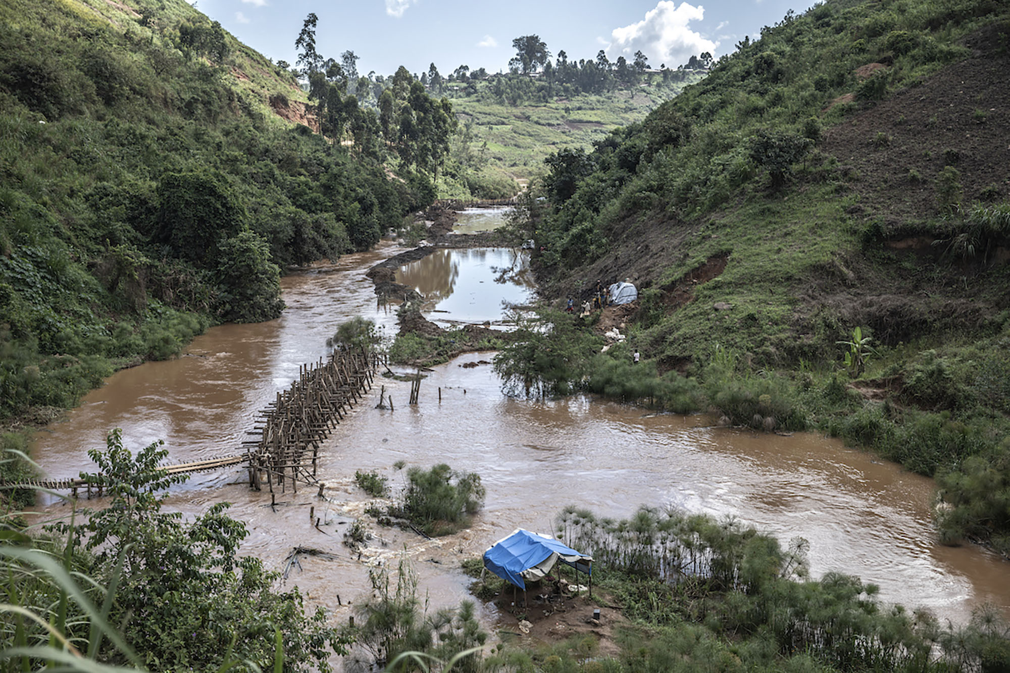 Iga Barrière, Ituri Province, May 2021.A Diverted Riverbank Gold Mine After Heavy Rain Led To The Mine Being Flooded Overnight. © Finbarr O'reilly For Fondation Carmignac