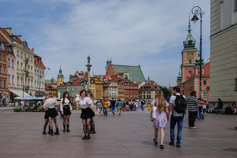 Joyful day in Warsaw Old Town by John Cavan