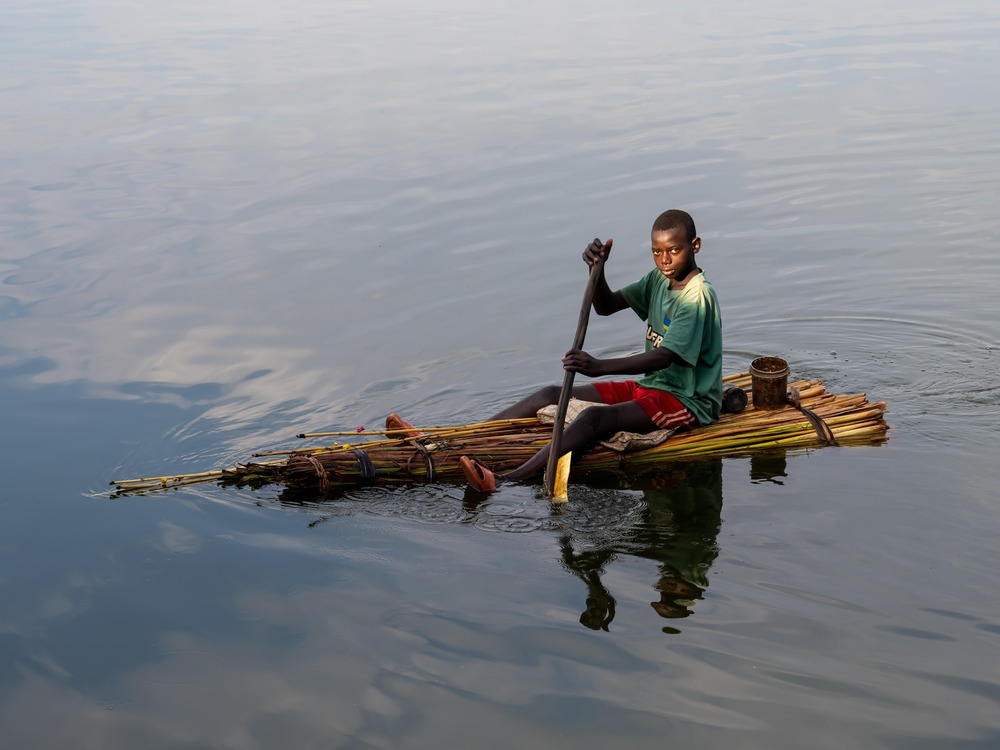 The Boy, Lake Muhazi, Republic Of Rwanda, Africa by Thomas Andy Branson