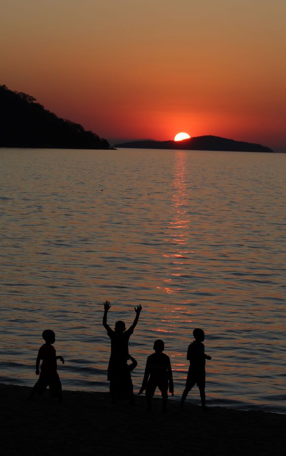 Sun Worshipers At Lake Malawi
