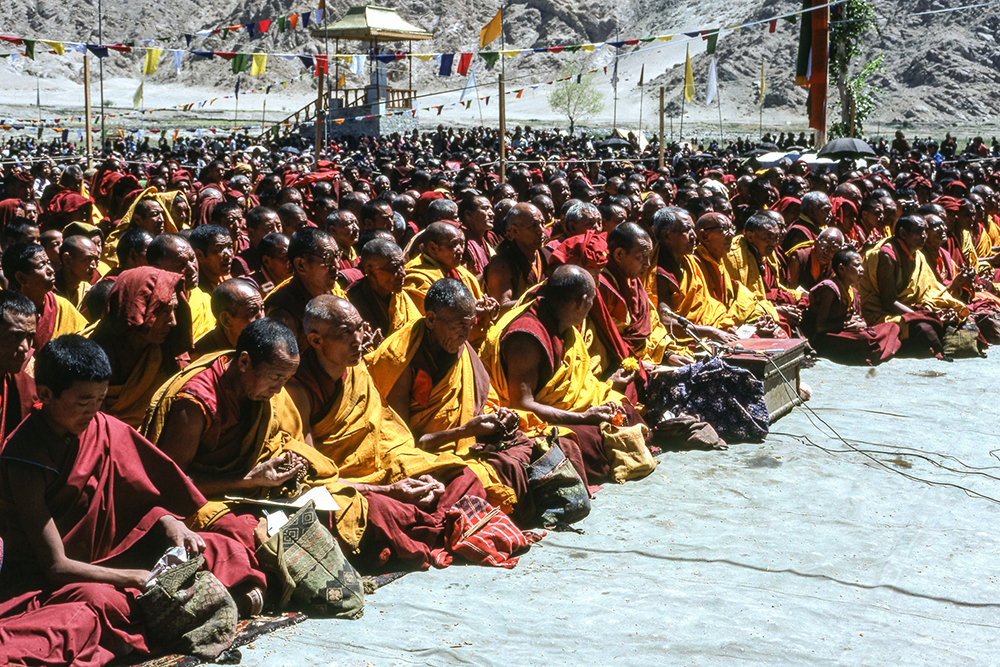 Monks Listening To The Dalai Lama In Ladakh In 1985 by David Huggett