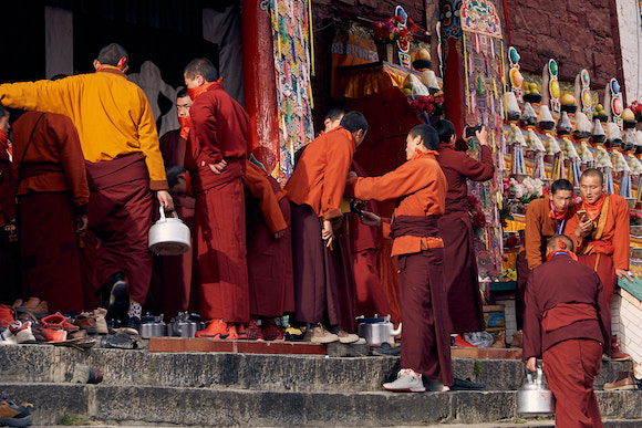 Tibetan Monks In Waiting